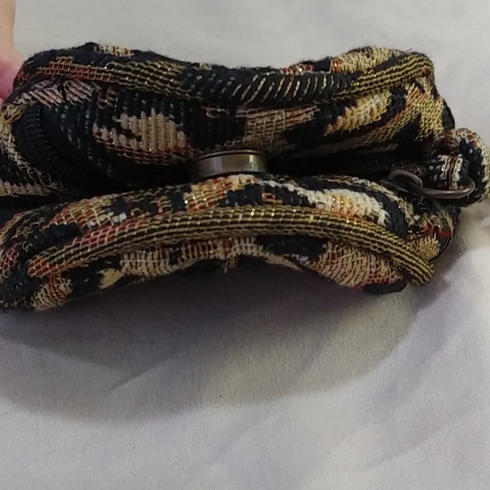 Leopard coin purse.  NEVER USED